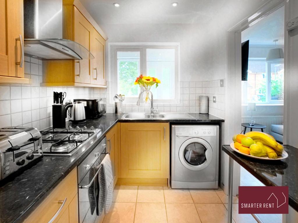 Bisley - 2 Bedroom House - Front Garden and Parking view 2