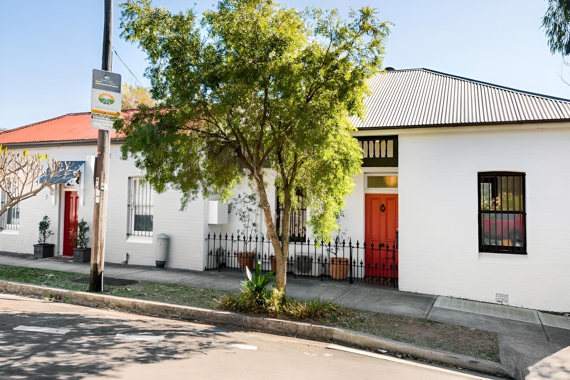 Historic 1890s House With Terraced Backyard Deck