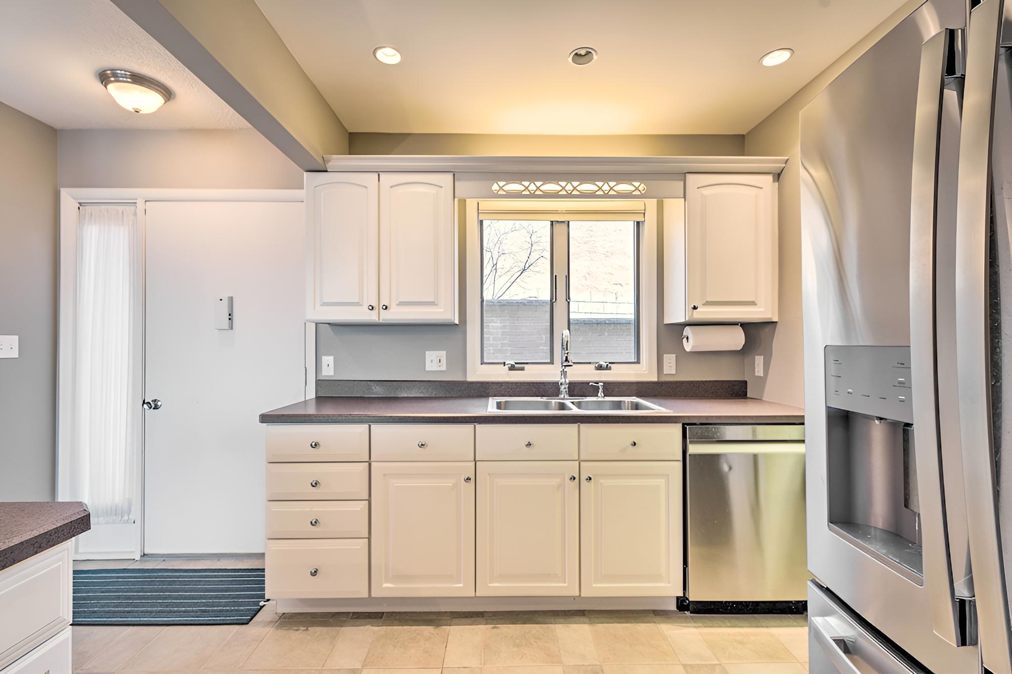 Waterfront Dewittville Condo w/ Furnished Balcony!