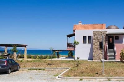 Seafront house with garden