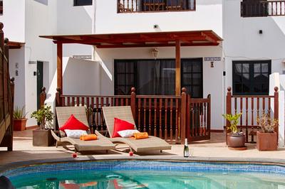 Casa Hibiscus - Shared Pool and BBQ - Close to Seafront Promenade By Lanzarote Vacation Homes