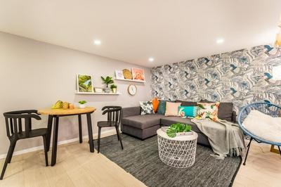 Chic Loft with Toucan Wallpaper and Airy Vibes