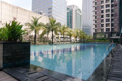 Comfy Studio Tamansari Semanggi Apartment By Travelio