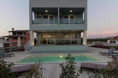 Modern villa Horizont with sea view pool and playroom