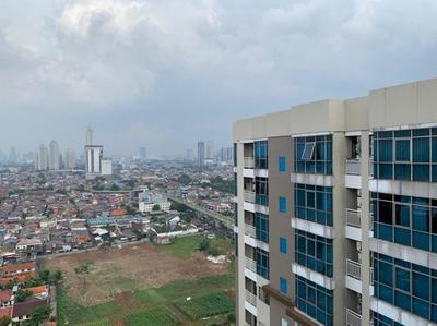 Cozy Living 1BR at Pakubuwono Terrace Apartment By Travelio