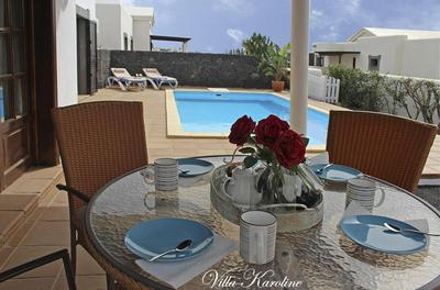 Villa Casa Karoline with a sunny terrace, heated pool, comfort and privacy in a quiet neighborhood