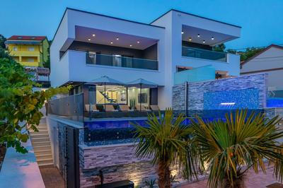 Luxury Villa Lorena with heated pool, jacuzzi,sauna and seaview