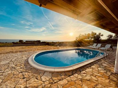 Beautiful secluded area near Novalja vacation house with pool and sea view Villa Lara