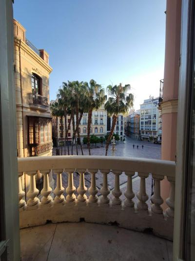 Historic 19th-Century Apartment with Balcony Overlooking Plaza