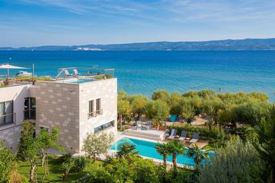 Luxury beachfront VILLA FLORES heated outdoor, indoor pool, whirlpool, sauna