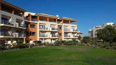 Luxurious first floor apartment with balconies overlooking pool and gardens.