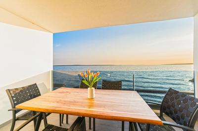 Blue waves, beachfront modern apartment