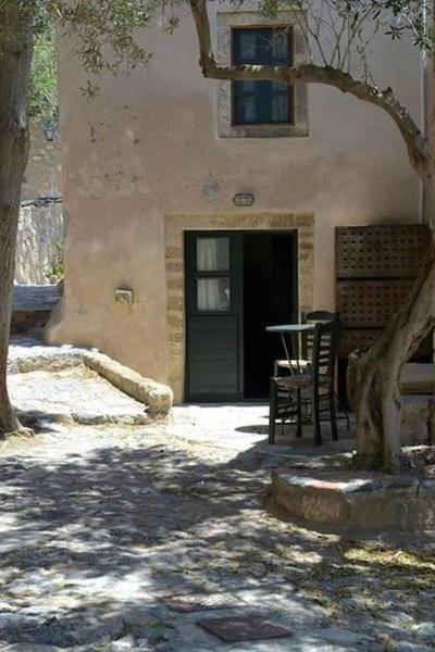 NEFELI castle stone house inside the fortress
