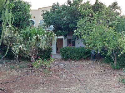 Christin P House with a large yard and parking