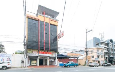 RedDoorz Plus at Cosmo Hotel & Studio Suites Kamuning