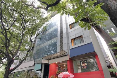 Capital O Elegant Amethyst Business Hotel Near Ragigudda Sri Prasanna Anjaneyaswamy Temple