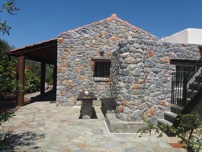 Stone house among trees