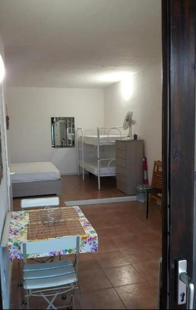Monolocale Arianna con giardino privato e piscina