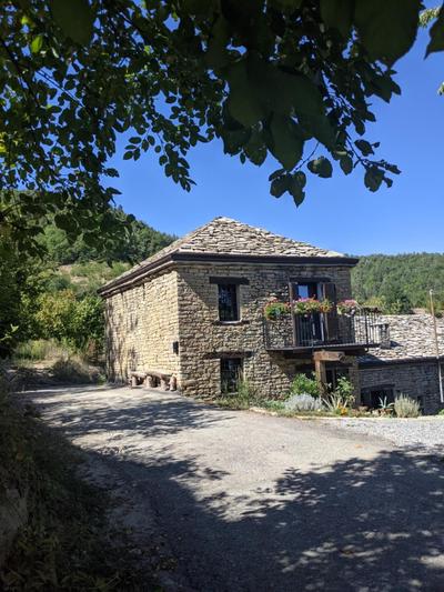 Country old stone house immerse in nature