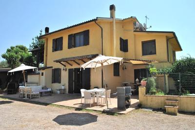 Saha tourist accommodation among olive trees and sea view