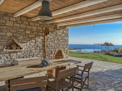 Beachfront villa Komos with heated pool