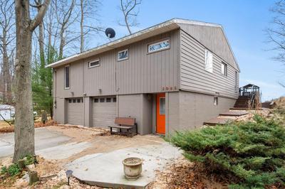 Lakefront House with Private Beach by Michigan Waterfront Luxury Properties
