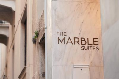 The Marble Suites, PLAKA