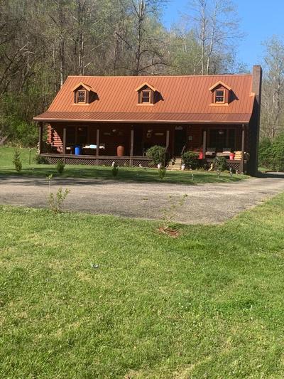 Log Cabin in the Field