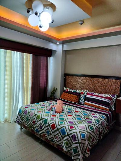 AFFORDABLE CONDOTEL NEAR AIRPORT at 2 PALM TREE VILLAS
