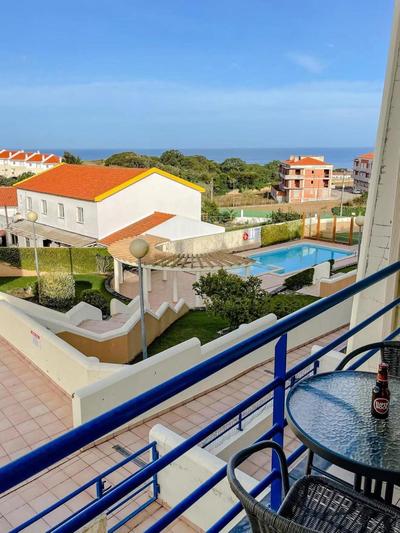 Peniche master bedroom with sea view balcony, private bathroom, shared kitchen, swimming pool, surfing resort