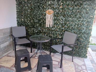 NEFELI'S HOUSE
