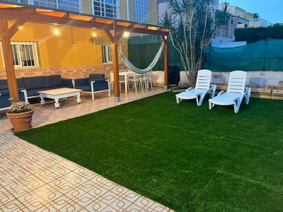 Apartamento playa Oliva con piscina y terraza compartida con los propietarios