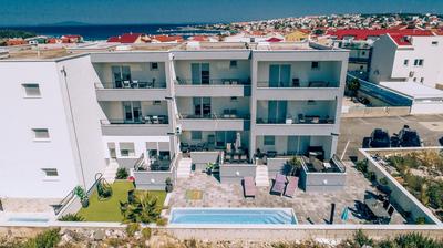 Apartments AM'AN with pool, Novalja