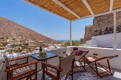 Cycladic traditional house with view