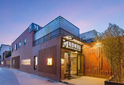 Meriton M Hotel The interior features a terrace offers laundry services Free coffee travel services and dining recommendations It is close to Sanlitun, a v