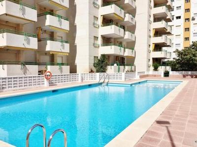 Apartamento en Gandía playa con piscina y garaje a 5min andando de la playa SOLO FAMILIAS o PAREJAS Numero de licencia turistica VT-48722-V