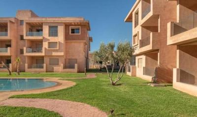 An elegant apartment for rent with a pool and a view of the mountains in Marrakesh