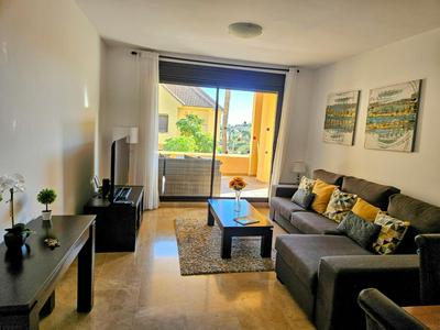 Ground floor 2 bed apartment La Duquesa with 5 pools and large terrace