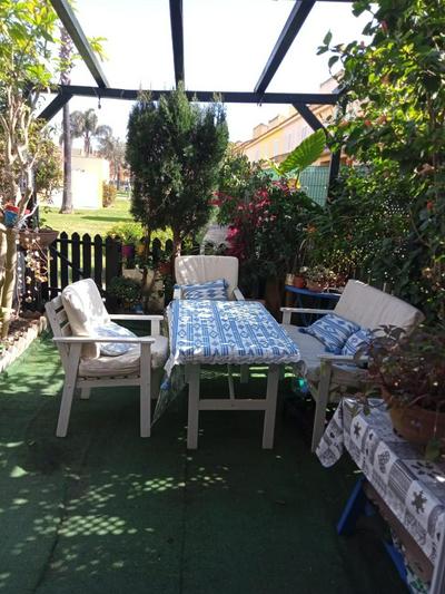 Casa coqueta con jardin