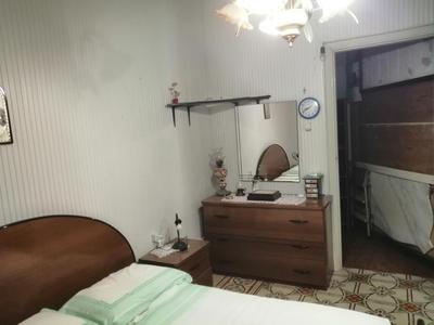 Appartamento con una camera matrimoniale, bagno in camera cucina e veranda esterni