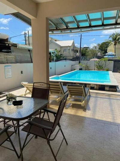 Splendid and modern 4 bedroom private villa with big pool near beach in flic en flac