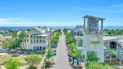 Home in Windmark Beach with golf cart, community pool and beach
