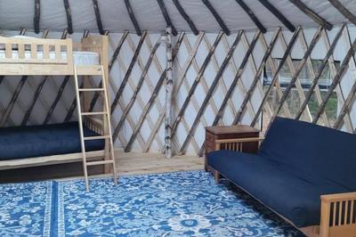 Allie Mae Yurt nestled in the woods