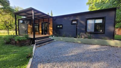 Naturaleza y Comodidad: Cabaña en Barrio Cerrado