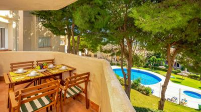 Riviera charm: 2BR Retreat with terrace pool