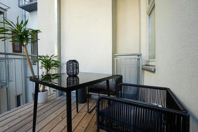 Contemporary apartment with a balcony.