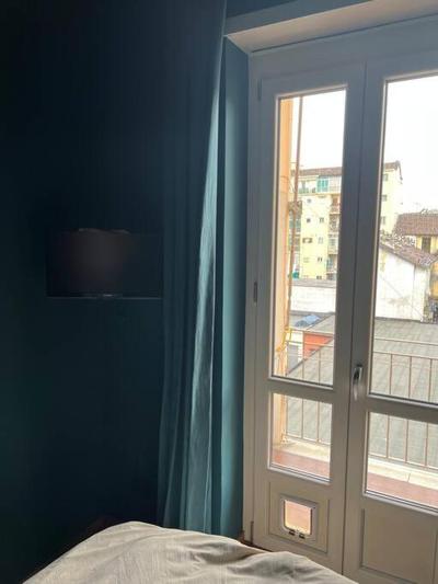 Room with private balcony on the Dora river