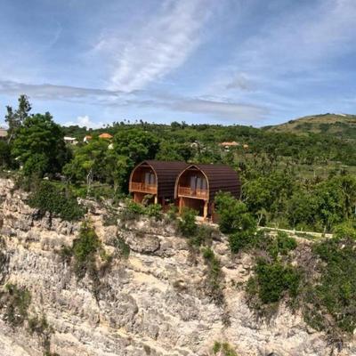 Suwehan Beach Cliff House by BIJAK