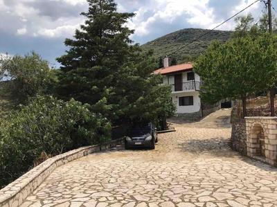 Theisoa.Old Little house in the garden . Andritsaina.