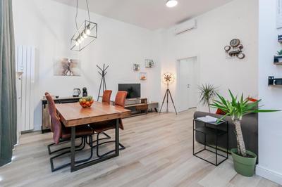 "Urban Retreat" elegante loft con aria condizionata